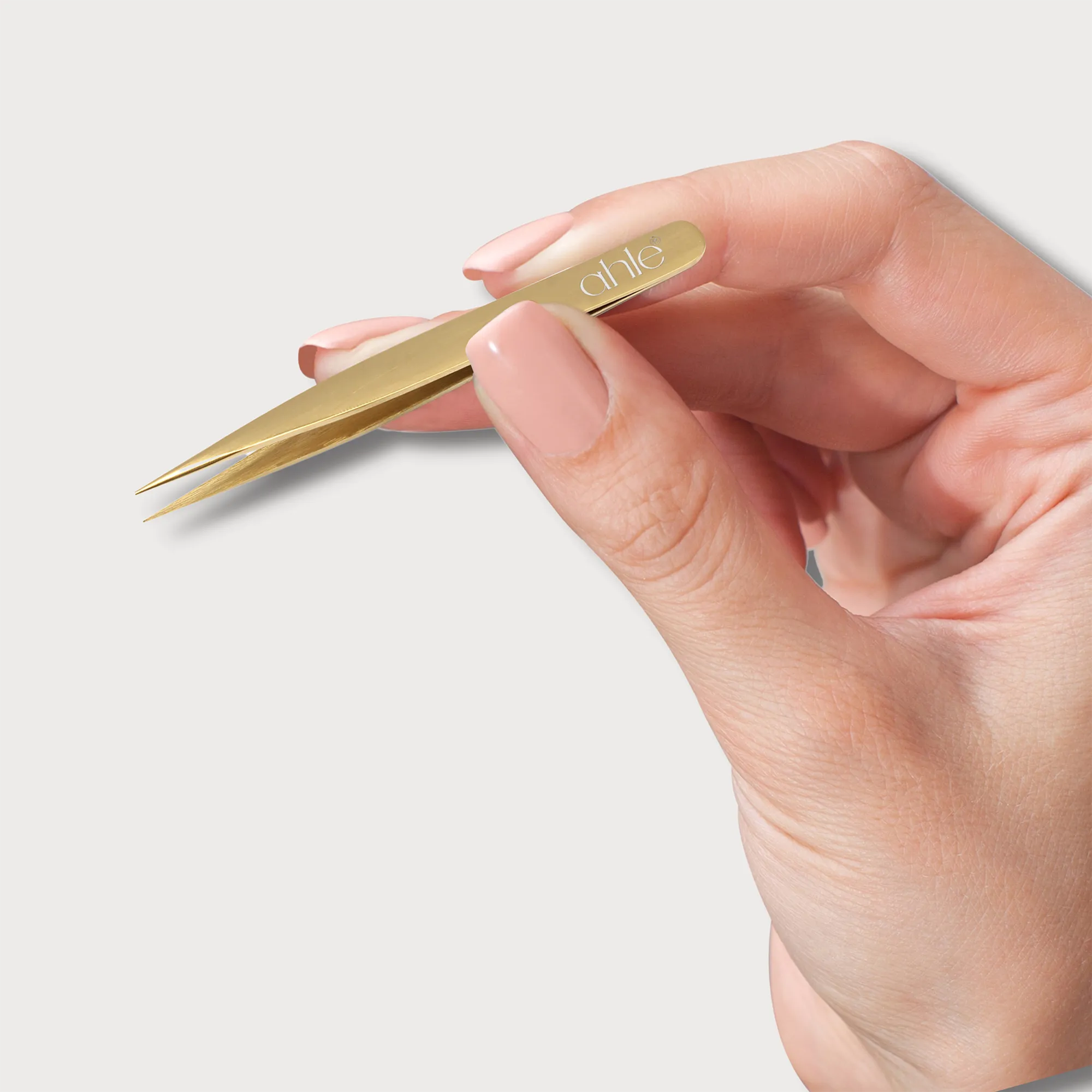 Pointed tweezers designed for precision grooming, facial hair, or eyebrow shaping.