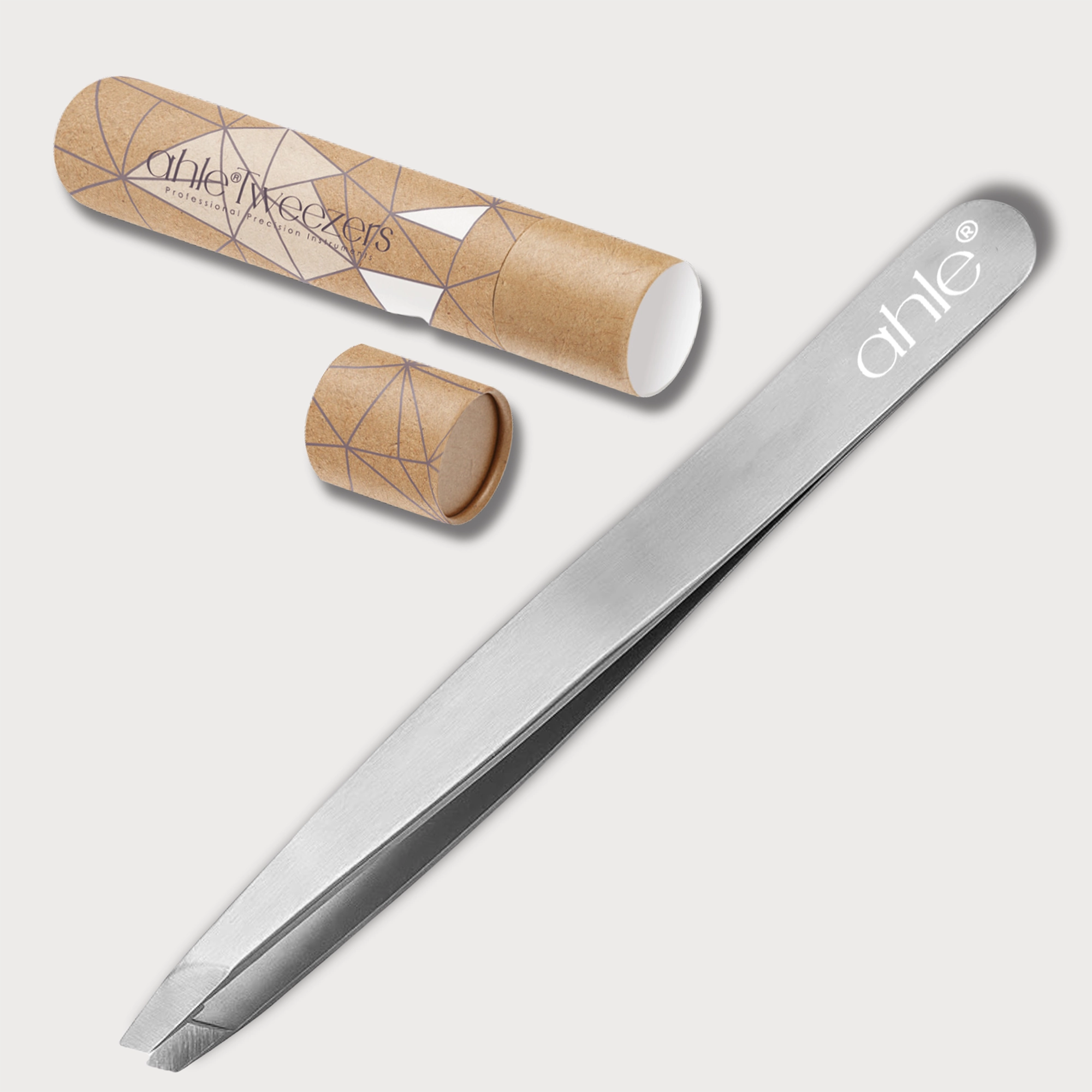 Professional tweezers for women with slanted tip for effortless facial hair removal.