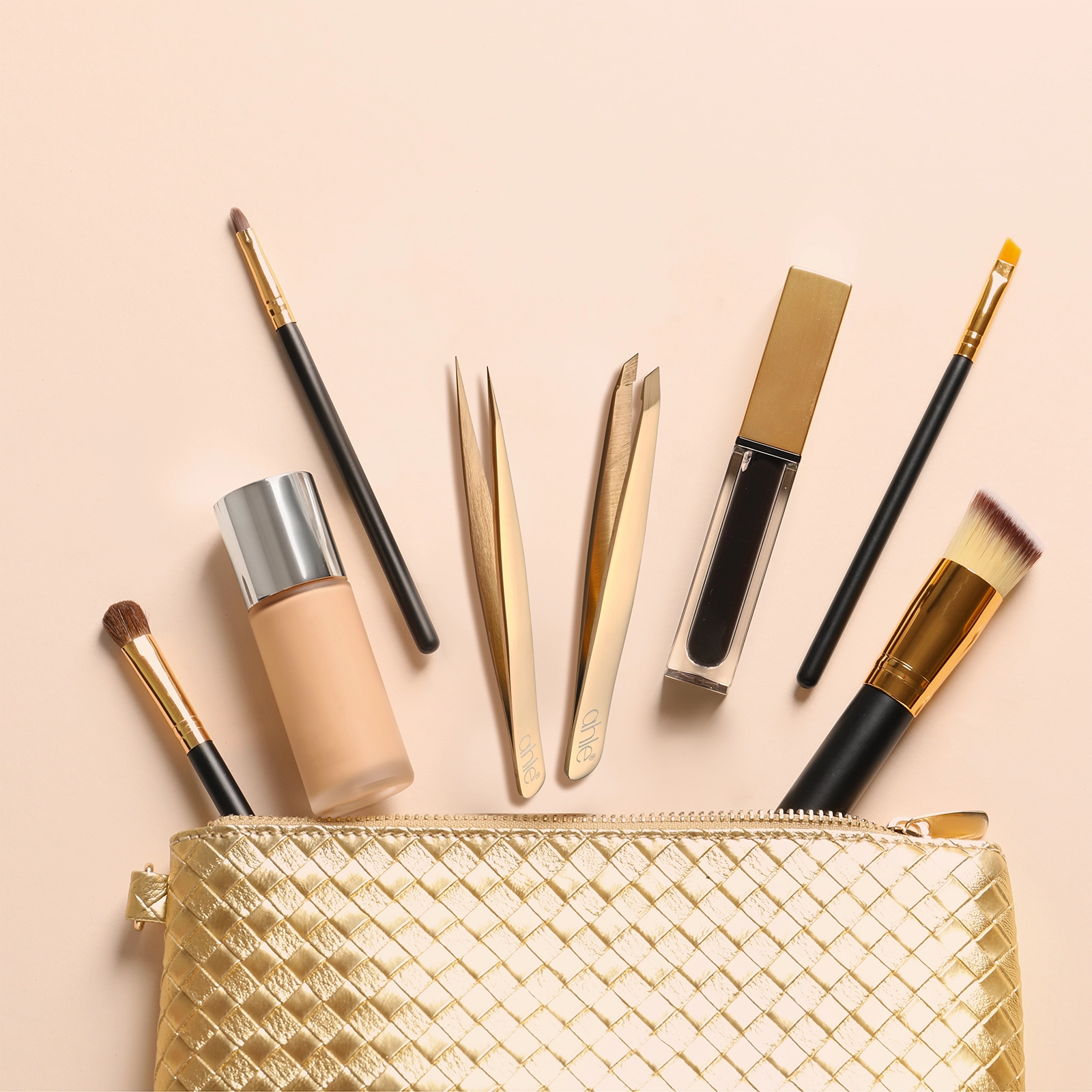 Compact rose gold tweezer set easily fitting in make up bag or travel toiletry bag